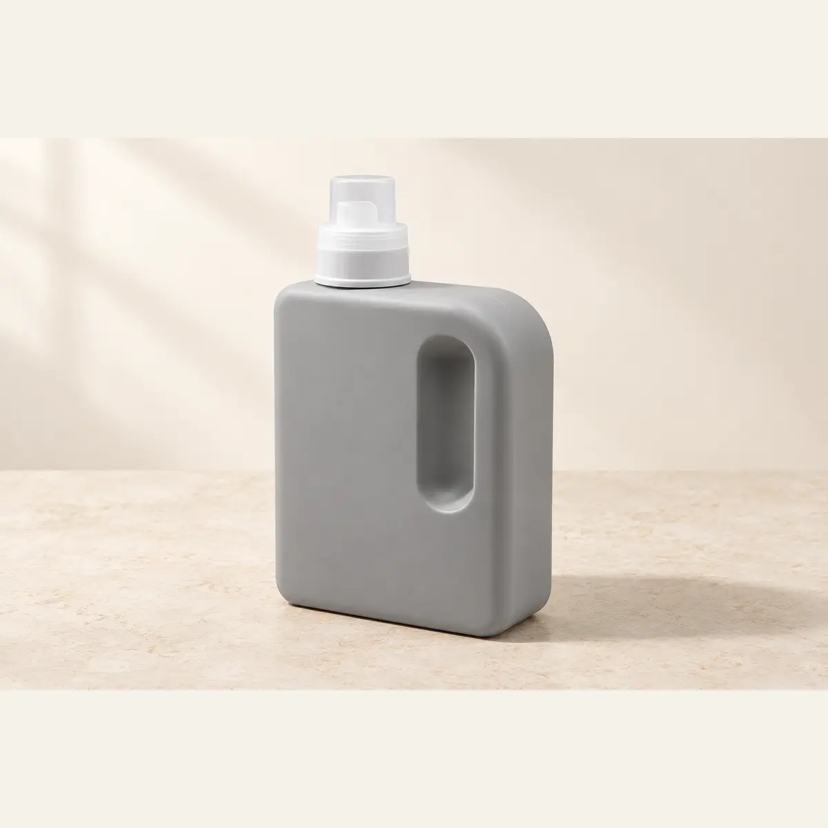 1.2 L Laundry Refill Bottle · Grey photographed on a warm neutral studio background