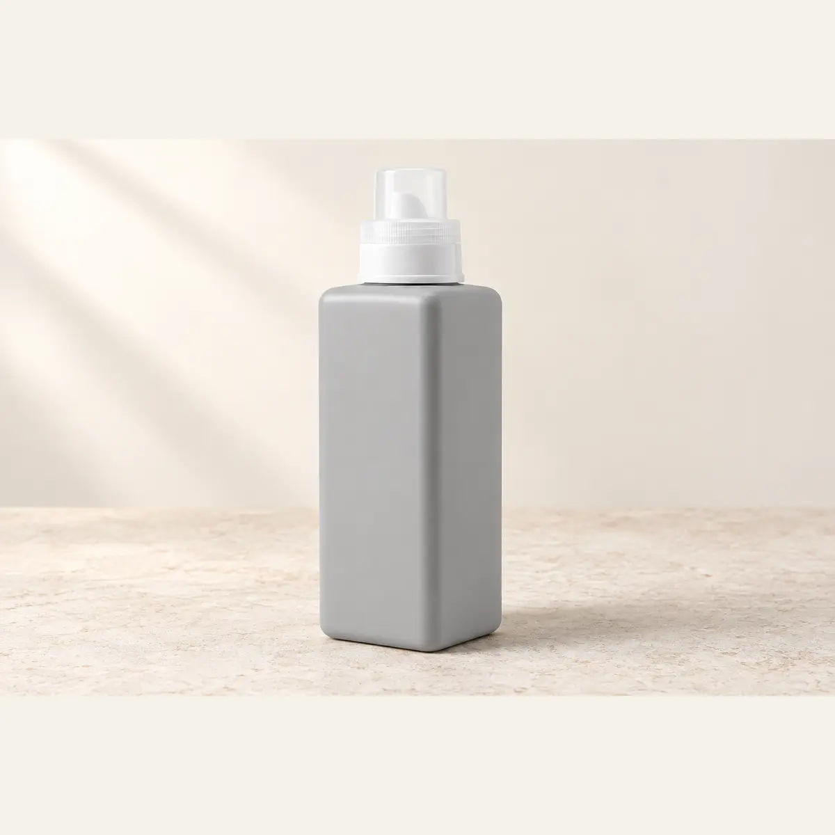 670 ml Laundry Refill Bottle · Grey photographed on a warm neutral studio background
