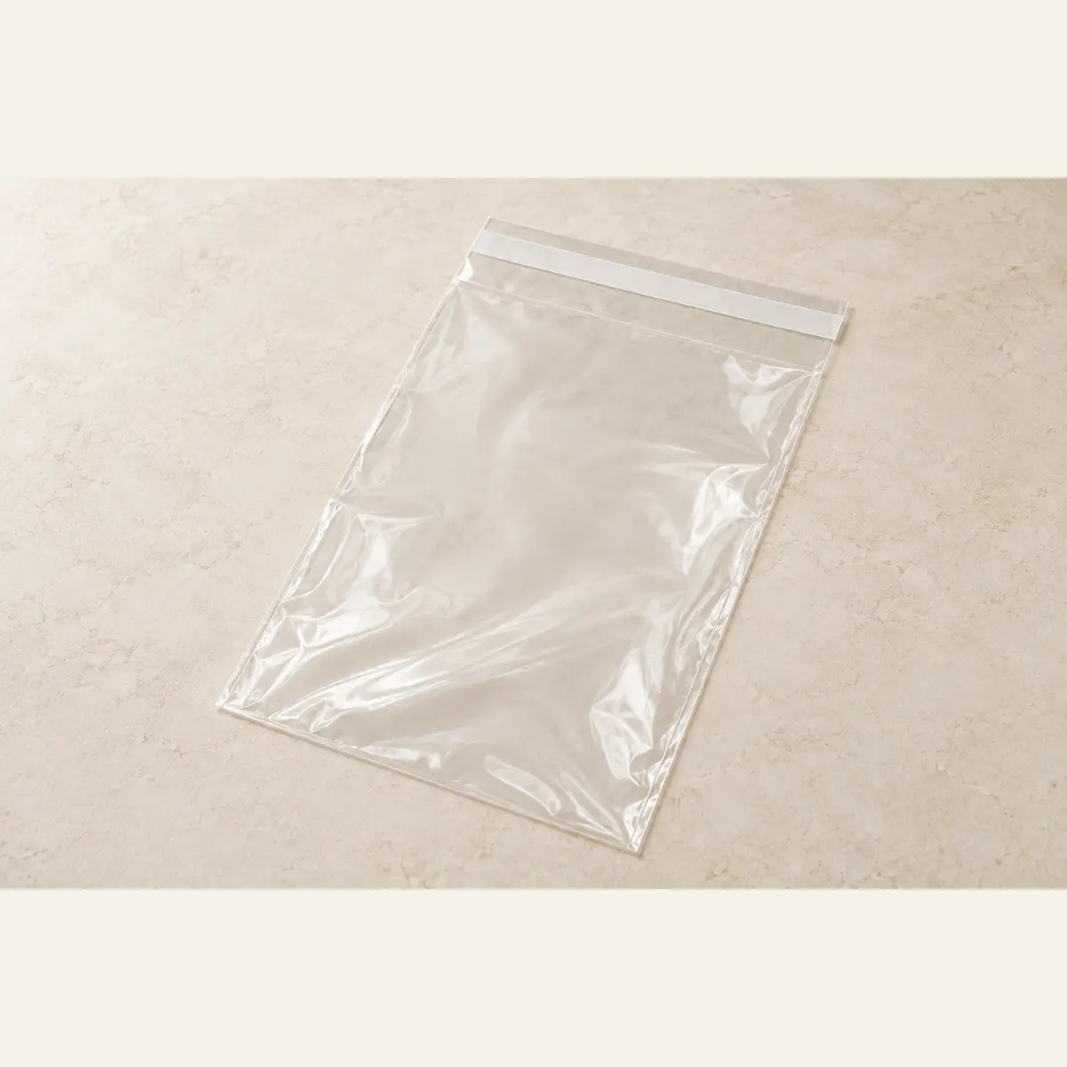 Clear Self-Seal Product Bag · 20 × 30 cm photographed on a warm neutral studio background